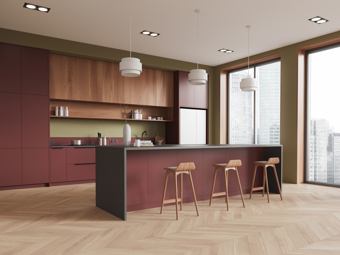 Vue-d-angle-intérieur-cuisine-avec-comptoir-évier-cuisinièrecouleur-bordeaux
